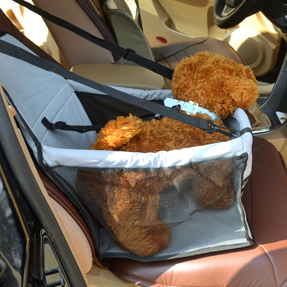 Waterproof and Foldable Car Booster Seat for Dogs with Clip-On Safety Leash and Storage Pocket.